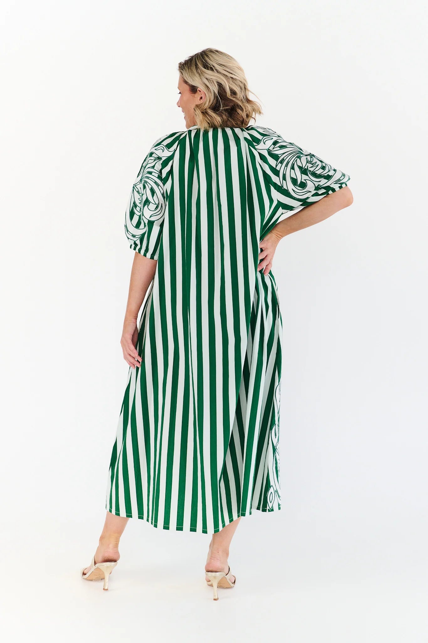 Back view of Ivy Green Dress pink striped cotton midi dress