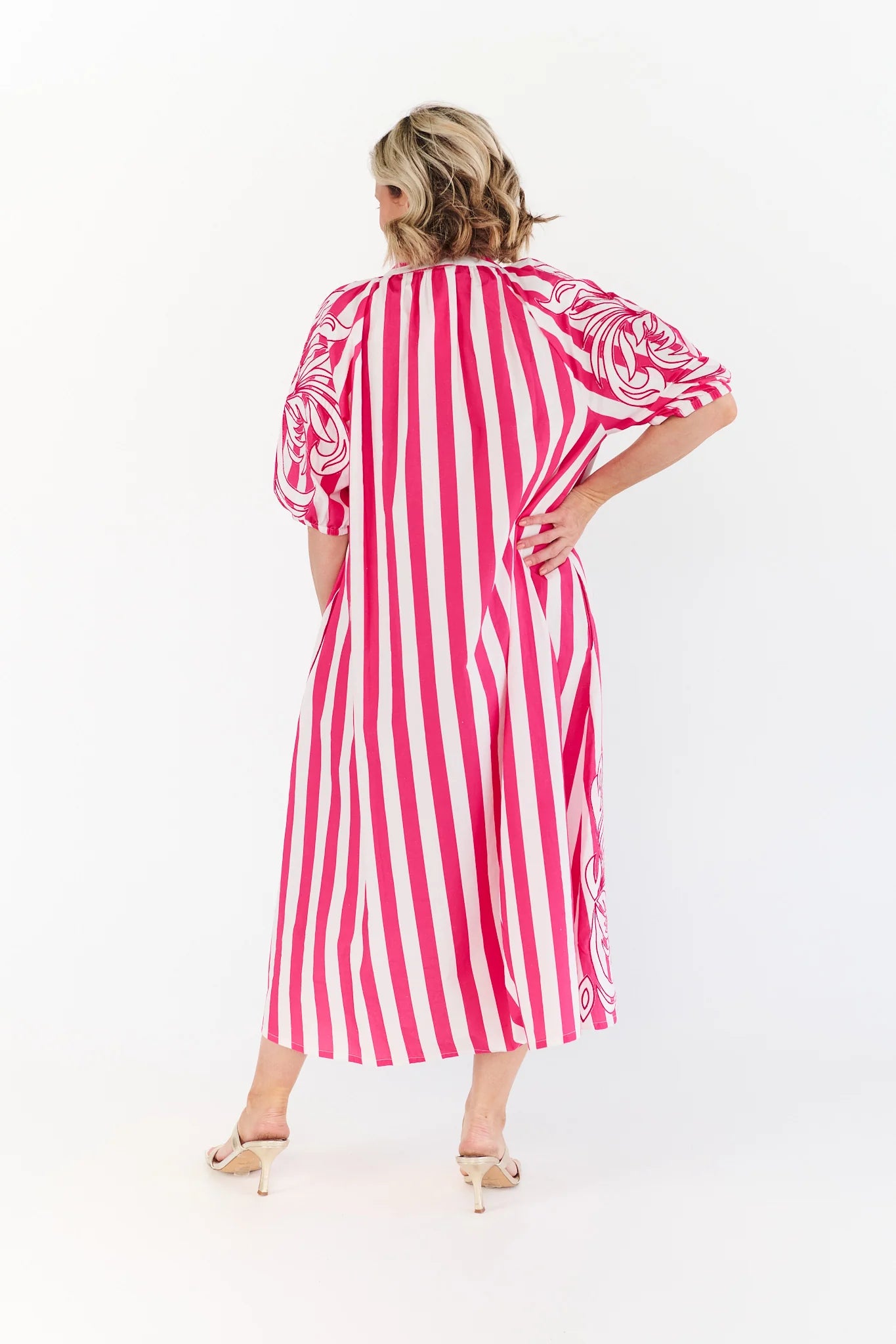 Back view of Ivy Pink Dress pink striped cotton midi dress
