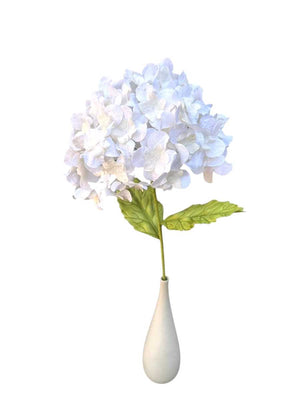 White hand crafted  paper hydrangea flower in a white vase on a white background