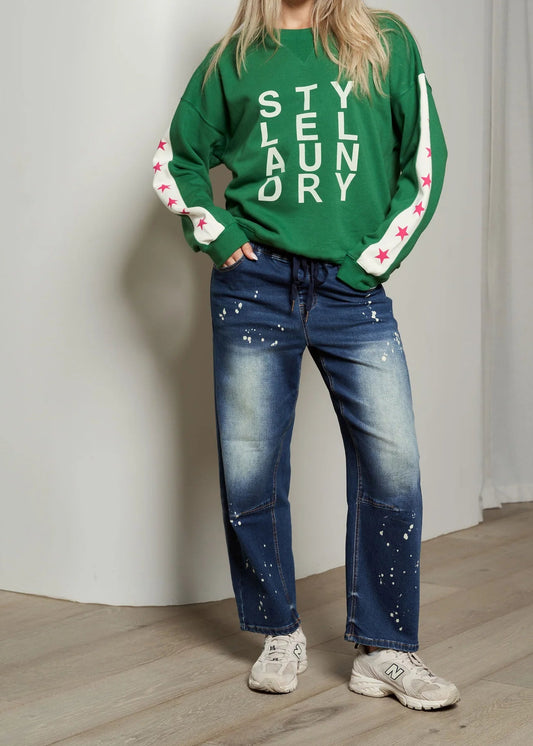 Blue paint splatter barrel jeans with relaxed tapered leg 