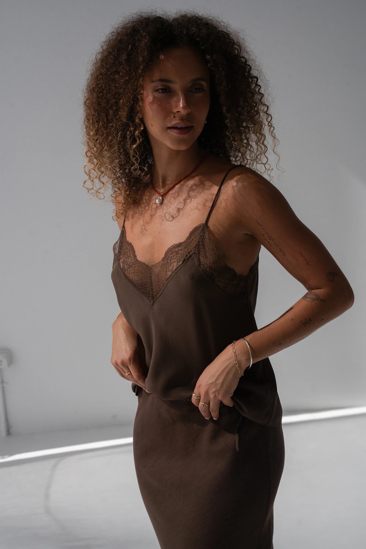 Women's bias cut silk camisole with lace trim brown